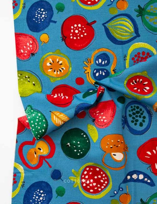 apples-and-poms-in-blue-fruit-salad-linen-canvas-by-kokka