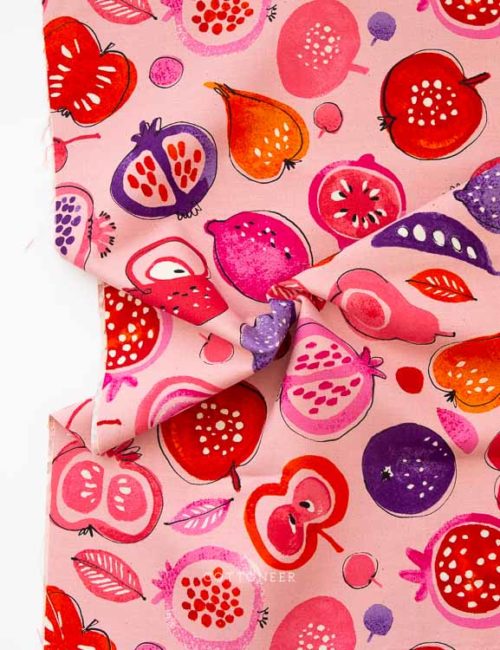 apples-and-poms-in-pink-fruit-salad-linen-canvas-by-kokka
