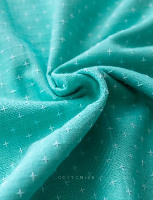 manchester-embroidered-cotton-in-turquoise-northern-lights-fabrics-2